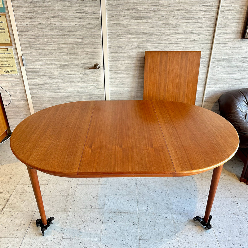 Danish Modern Round Extending Teak Dining Table By Henry Kjærnulf