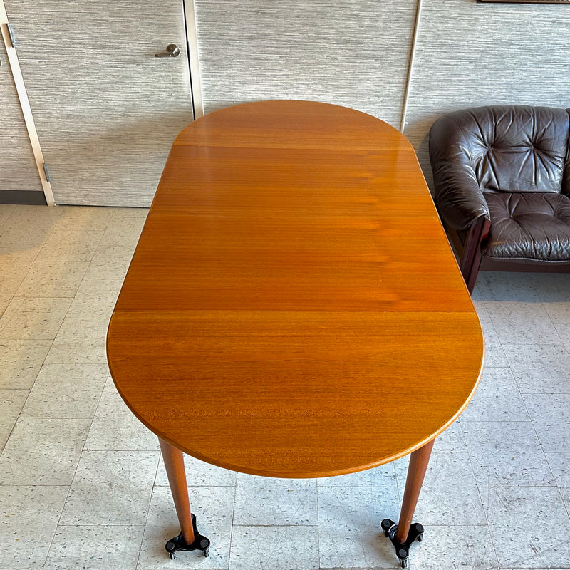 Danish Modern Round Extending Teak Dining Table By Henry Kjærnulf