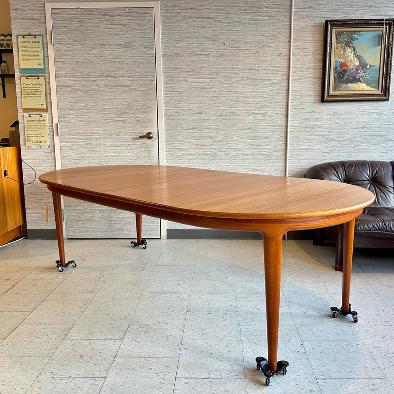 Danish Modern Round Extending Teak Dining Table By Henry Kjærnulf