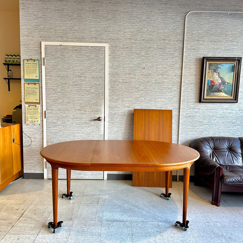 Danish Modern Round Extending Teak Dining Table By Henry Kjærnulf