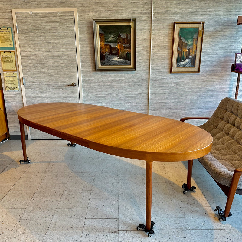 Generous Danish Modern Teak Extending Oval Dining Table