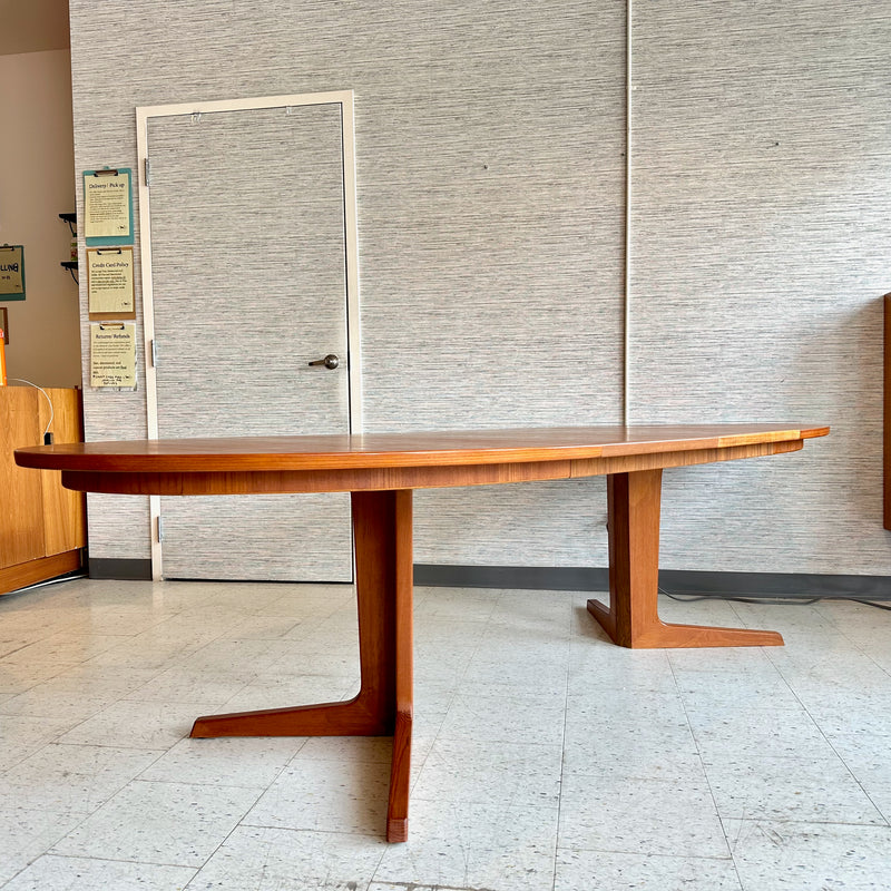 Generous Danish Modern Teak Extending Oval Pedestal Leg Dining Table