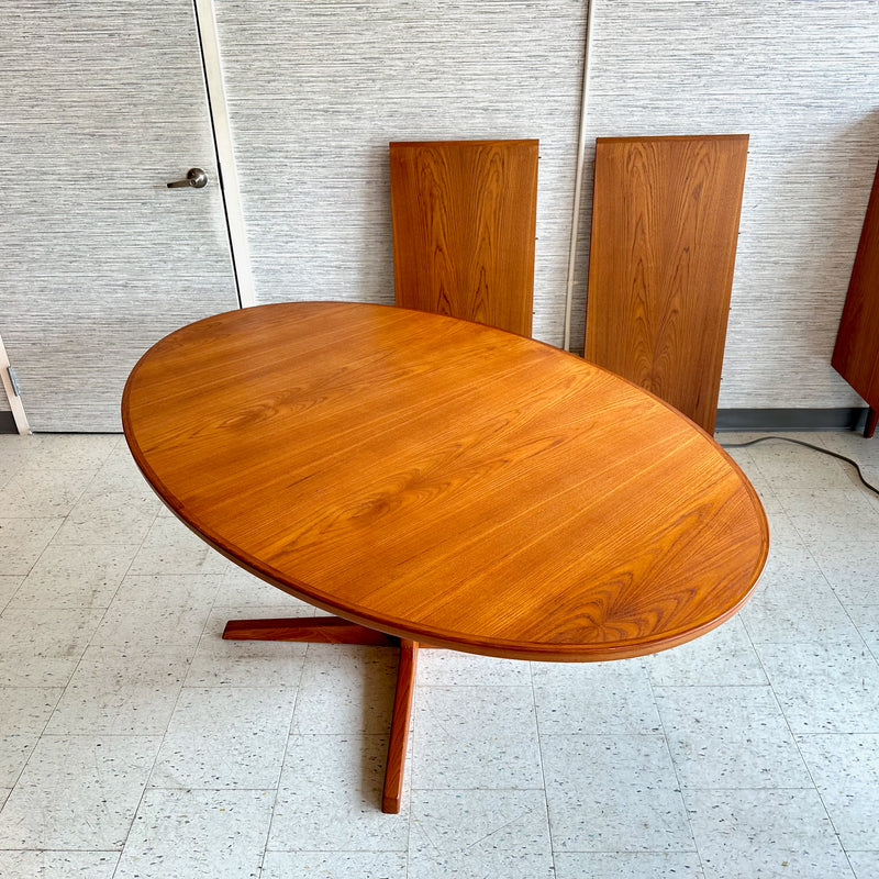 Generous Danish Modern Teak Extending Oval Pedestal Leg Dining Table