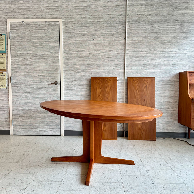 Generous Danish Modern Teak Extending Oval Pedestal Leg Dining Table