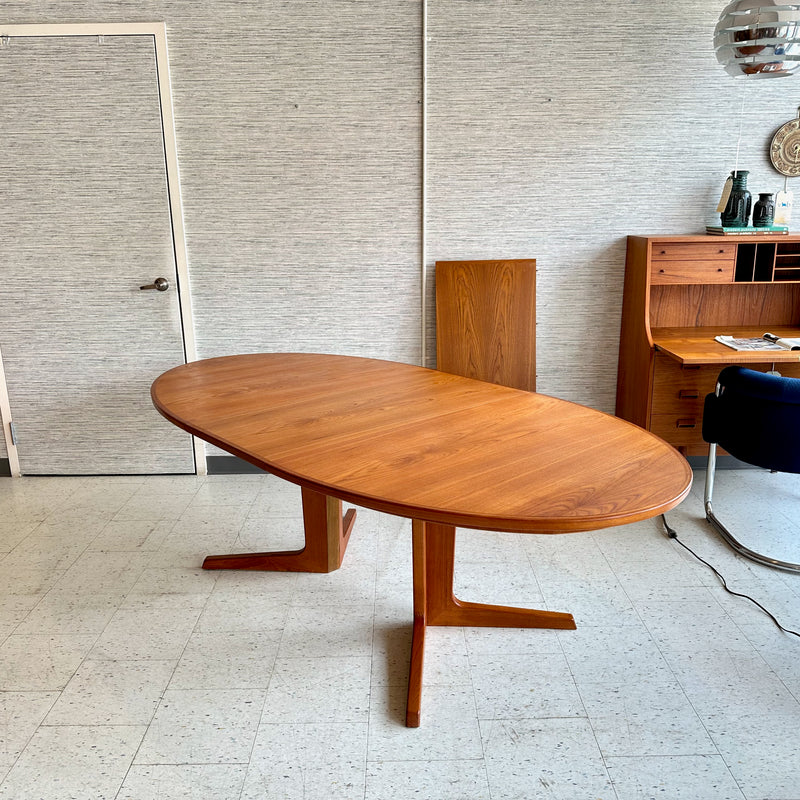 Generous Danish Modern Teak Extending Oval Pedestal Leg Dining Table