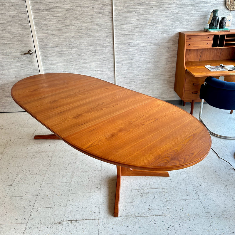 Generous Danish Modern Teak Extending Oval Pedestal Leg Dining Table