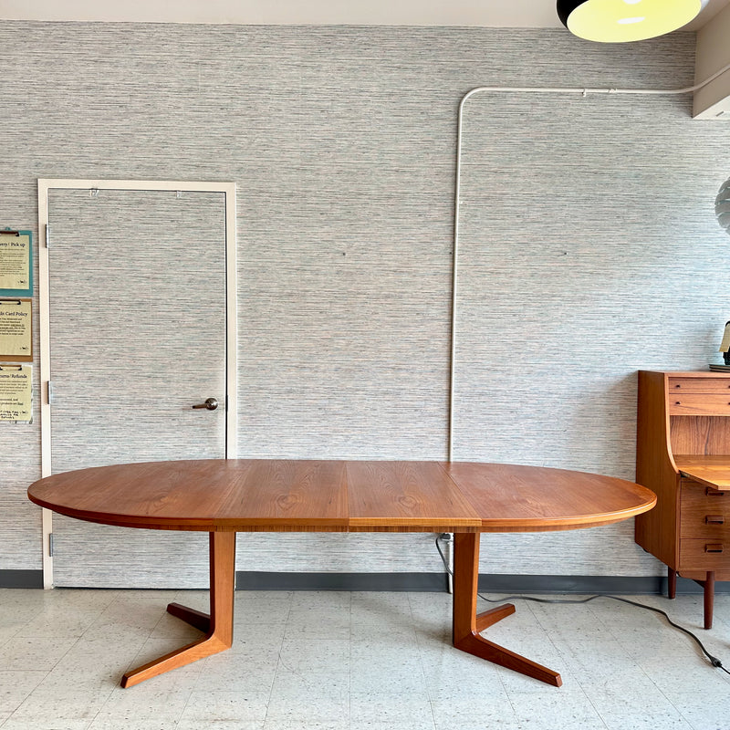 Generous Danish Modern Teak Extending Oval Pedestal Leg Dining Table