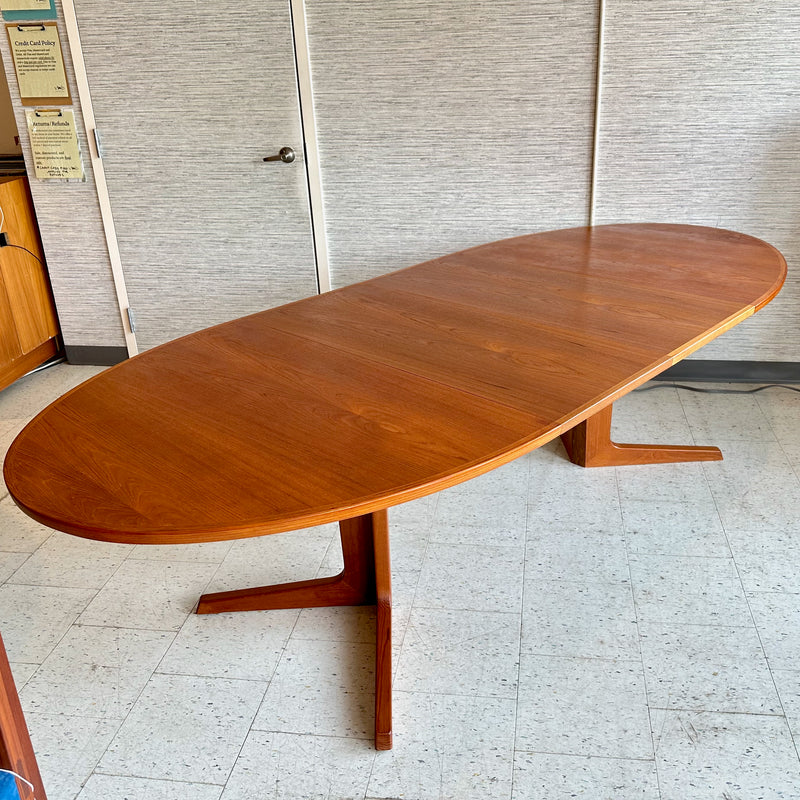 Generous Danish Modern Teak Extending Oval Pedestal Leg Dining Table