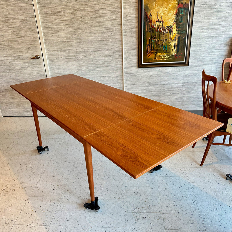 Model 9 Danish Modern Extending Dining Table By Niels Moller In Teak