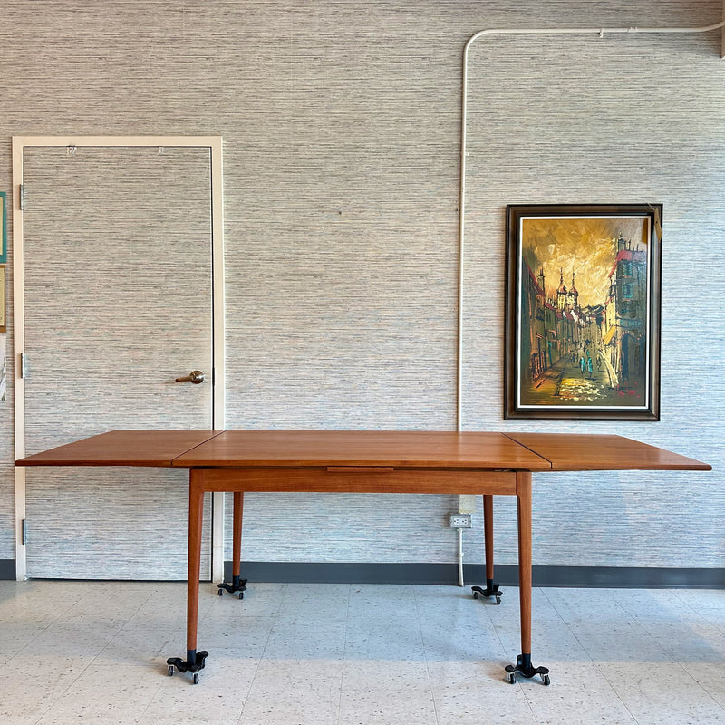 Model 9 Danish Modern Extending Dining Table By Niels Moller In Teak